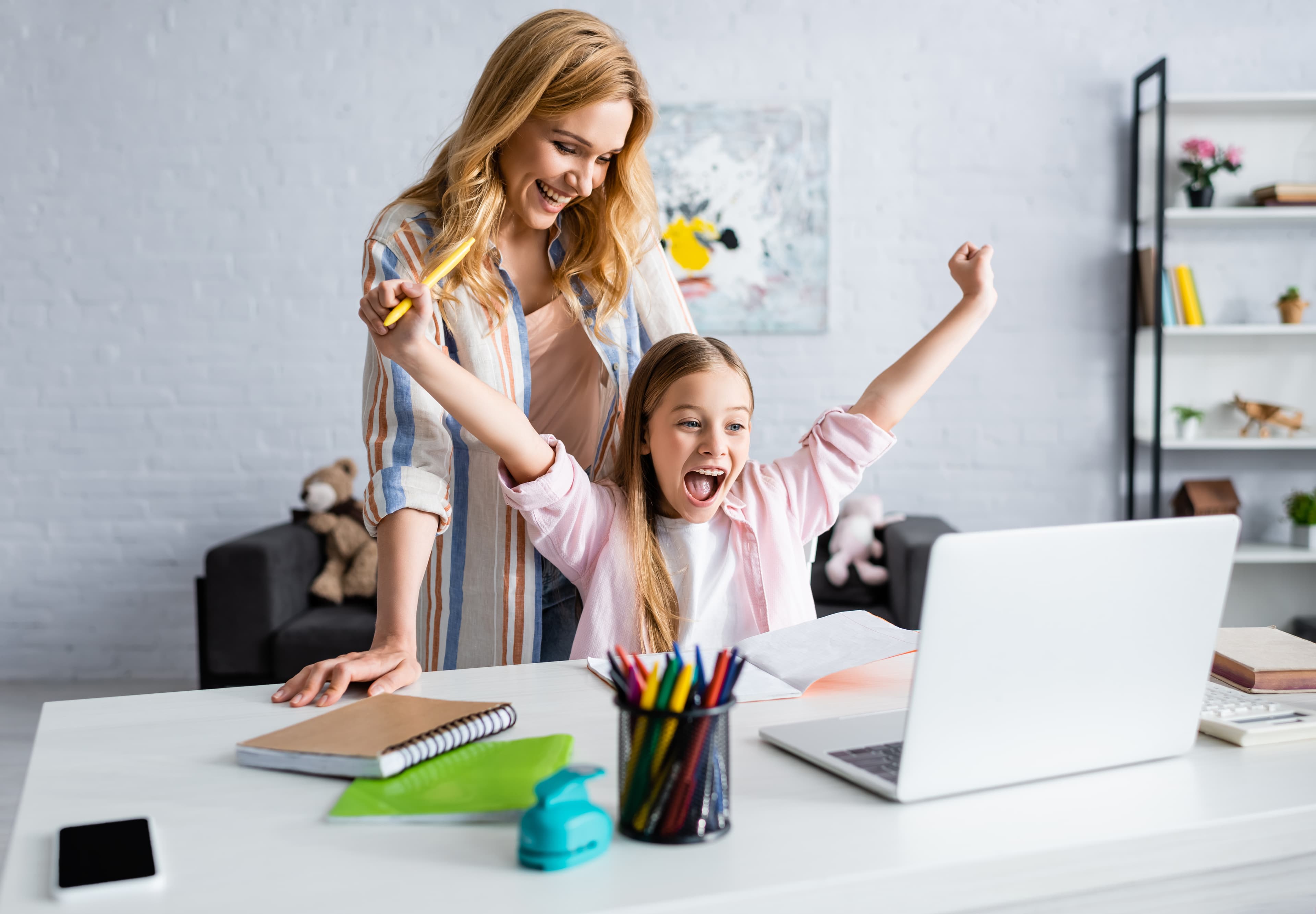 A tutor teaching maths online from home