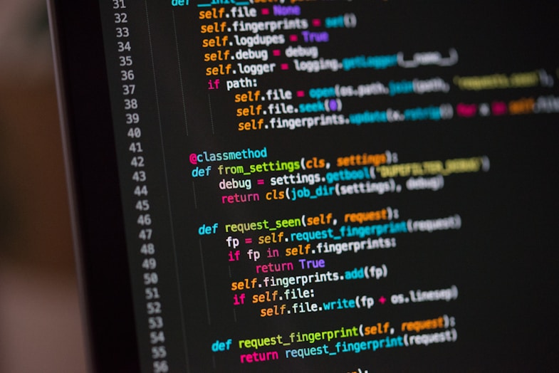 A close-up of colourful code on a computer screen